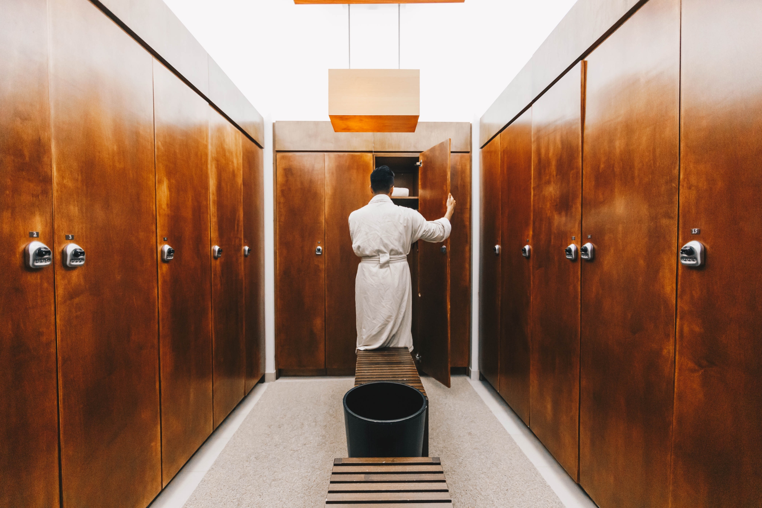 Man looking in locker