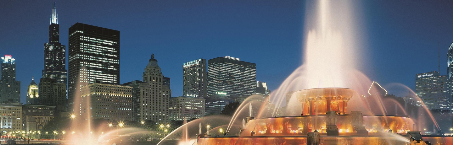 fountain lit up at night