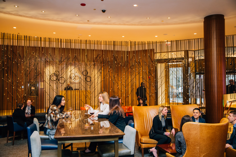 people drinking at the lobby bar