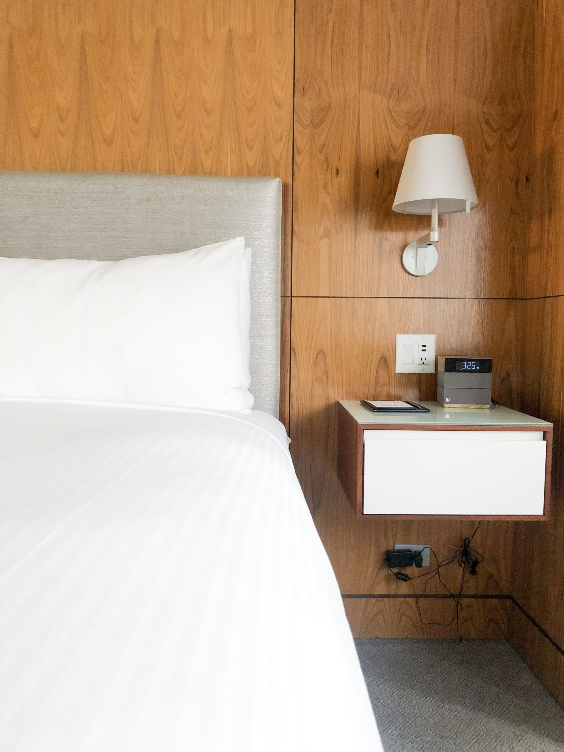 close up of bed and nightside table