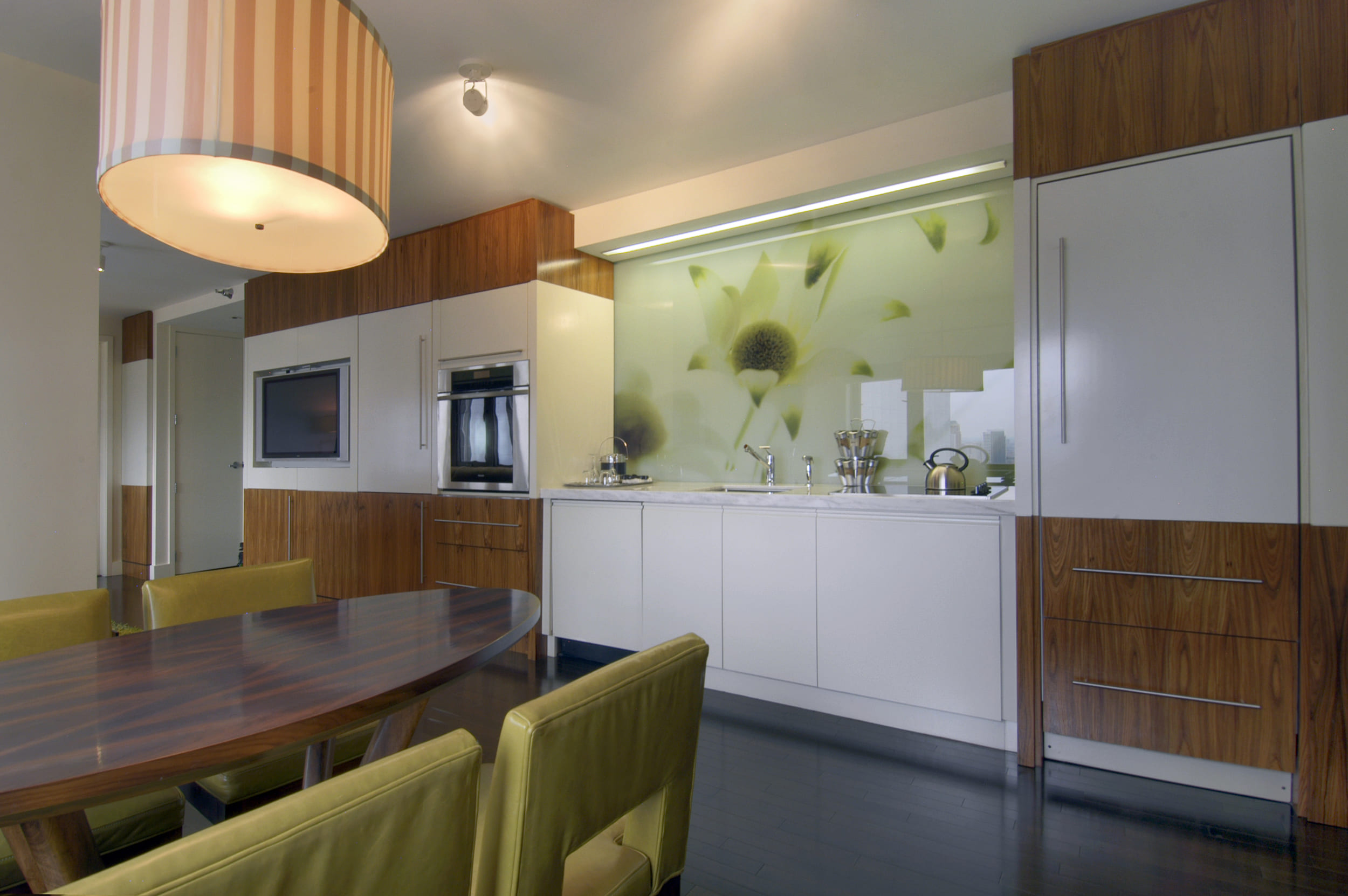 kitchen and dining room area with hints of green