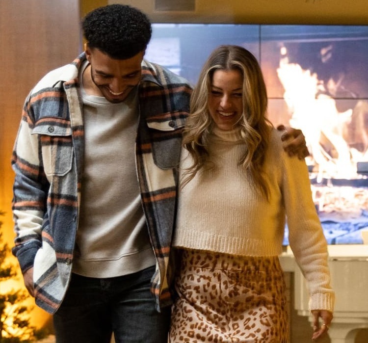 Couple walking through lobby
